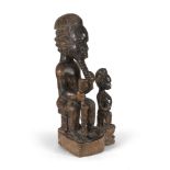 AFRICAN SCULPTURE OF ROYAL GROUP, BAULÈ LATE 19TH CENTURY
