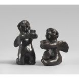 A PAIR OF POTTERY CANDLESTICKS, SOUTH AMERICA, 20TH CENTURY