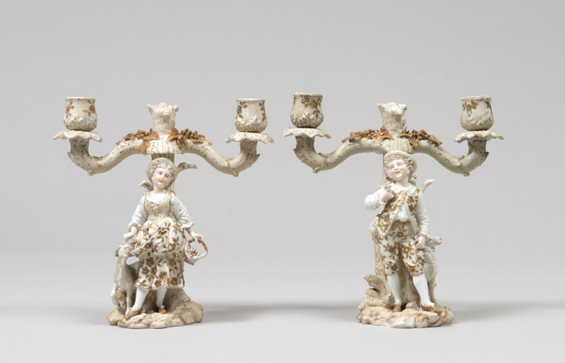 A PAIR OF BISCUIT CANDELABRA, EARLY 20TH CENTURY