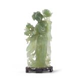 A CHINESE CARVED SERPENTINE SCULPTURE, DEPICTING YANG GUIFEI, 20TH CENTURY