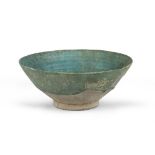 A GREEN GLAZED CERAMIC BOWL, PERSIA 12TH CENTURY.