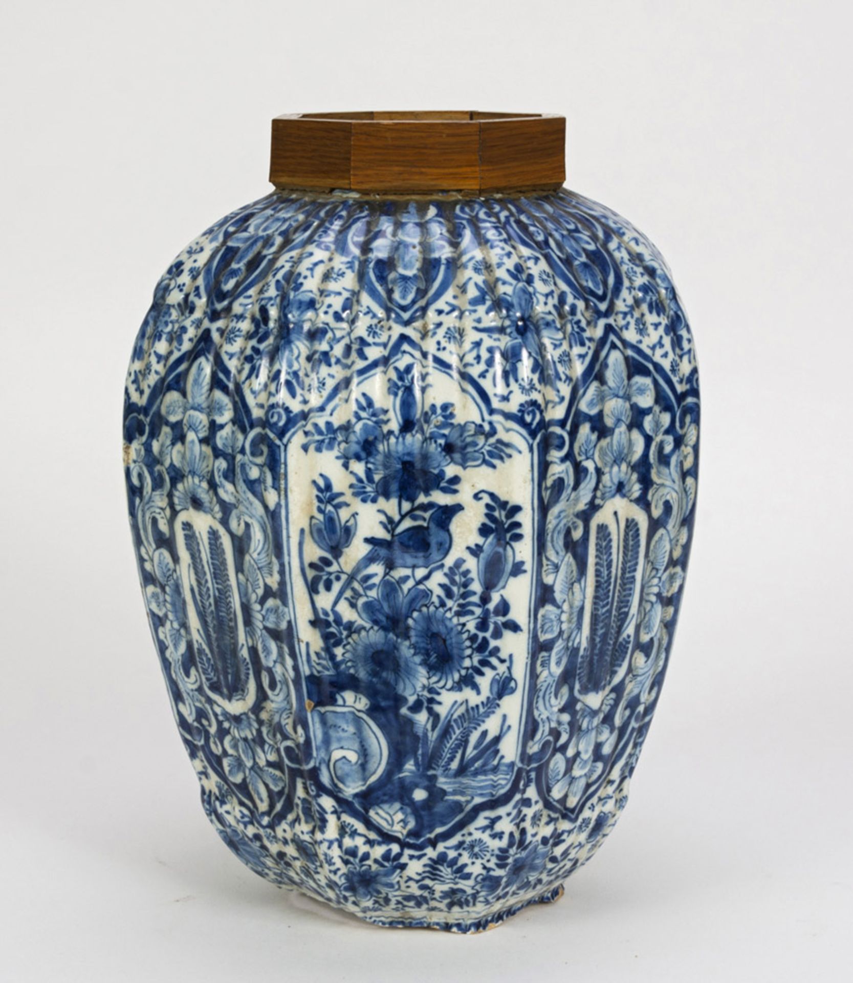 REMAINS OF AWHITE AND BLUE CERAMIC VASE, DELFT, 18TH CENTURY