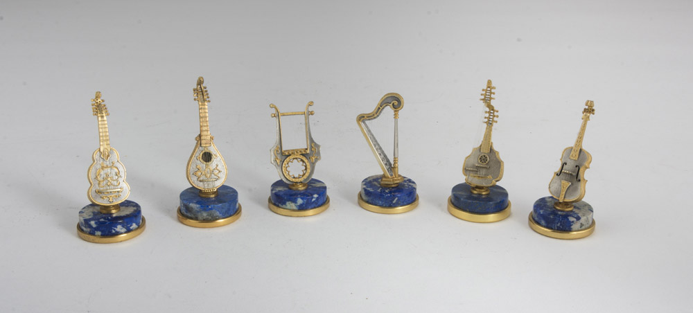 SIX MODELS IN GILDED SILVER – 20TH CENTURY