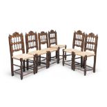 Six walnut-tree chairs with seats in straw – 19th century.