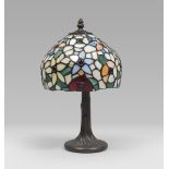 SMALL LAMP TIFFANY STYLE, 20TH CENTURY with lampshade in leaded glass paste and base in bronze.