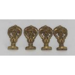 FOUR SMALL FRIEZES IN ORMOLU, 19TH CENTURY chiseled to double spiral with leaves and flower.