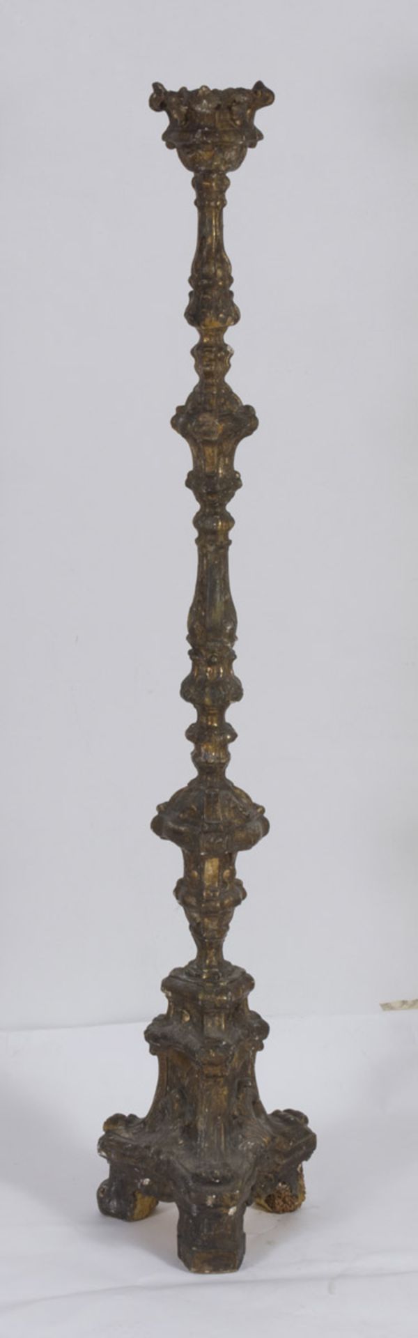 TALL GILTWOOD CANDLESTICK, ROME 18TH CENTURY shaft carved to leaves and spirals. Triangular base