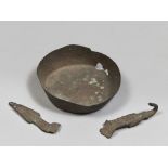 ONE BOWL AND TWO OBJECTS IN BRONZE, 3rd-1st CENTURY A.C. consisting of a small bronze bowl, a buckle