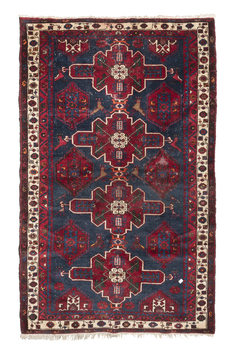 KARABAGH CARPET, EARLY 20TH CENTURY to triple cross medallion, with secondary motifs of simbologies,