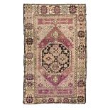 RARE CARPET ANATOLICO GHIORDES, 19TH CENTURY with stars medallion flowers and secondary motifs of