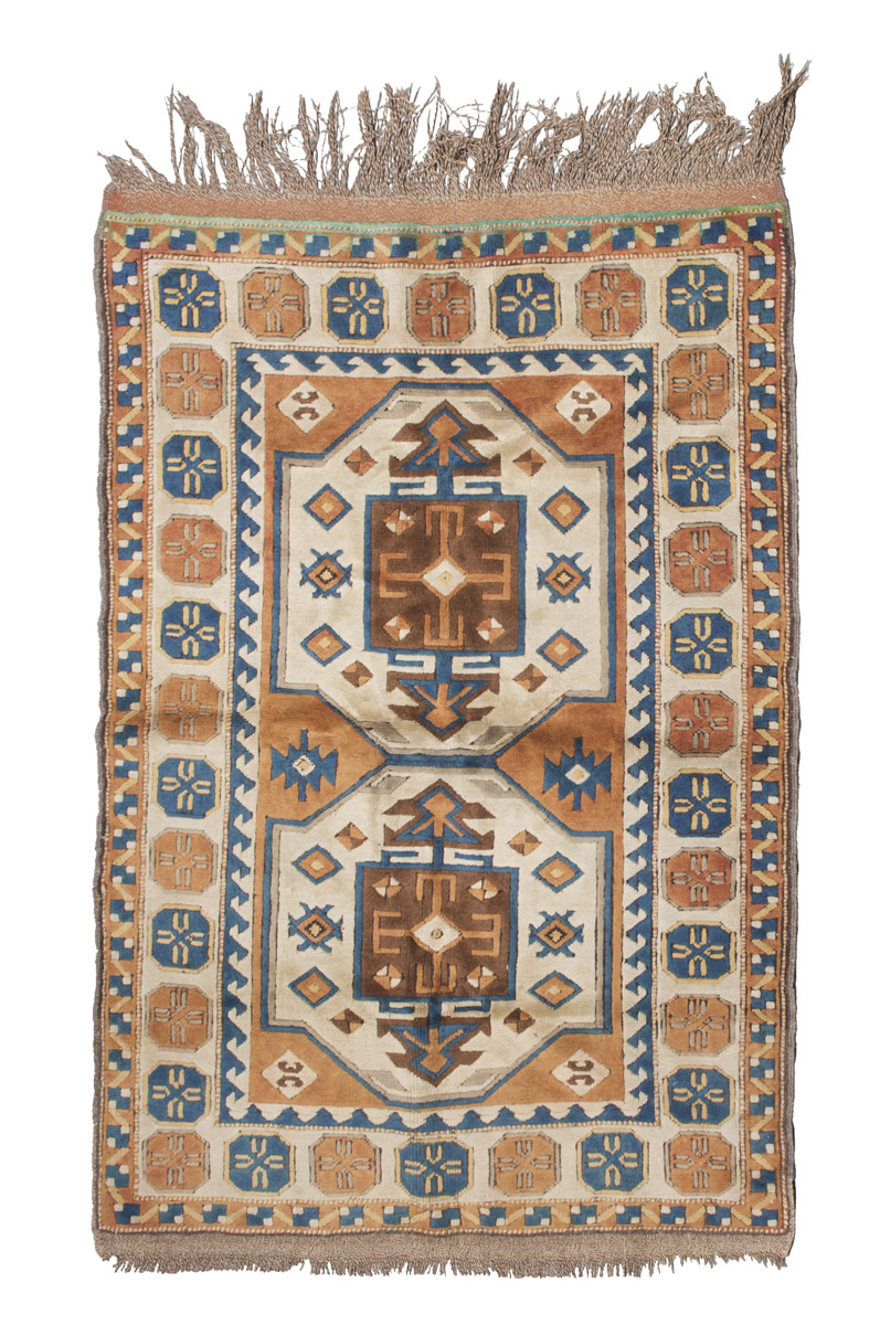 KARS CARPET, MID TWENTIETH CENTURY medallion with double niche in the central field at the bottom of