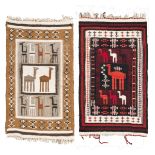 TWO NORTHAFRICAN CARPETS, 20TH CENTURY with design of camels and ornaments. Measures cm. 128 x 77