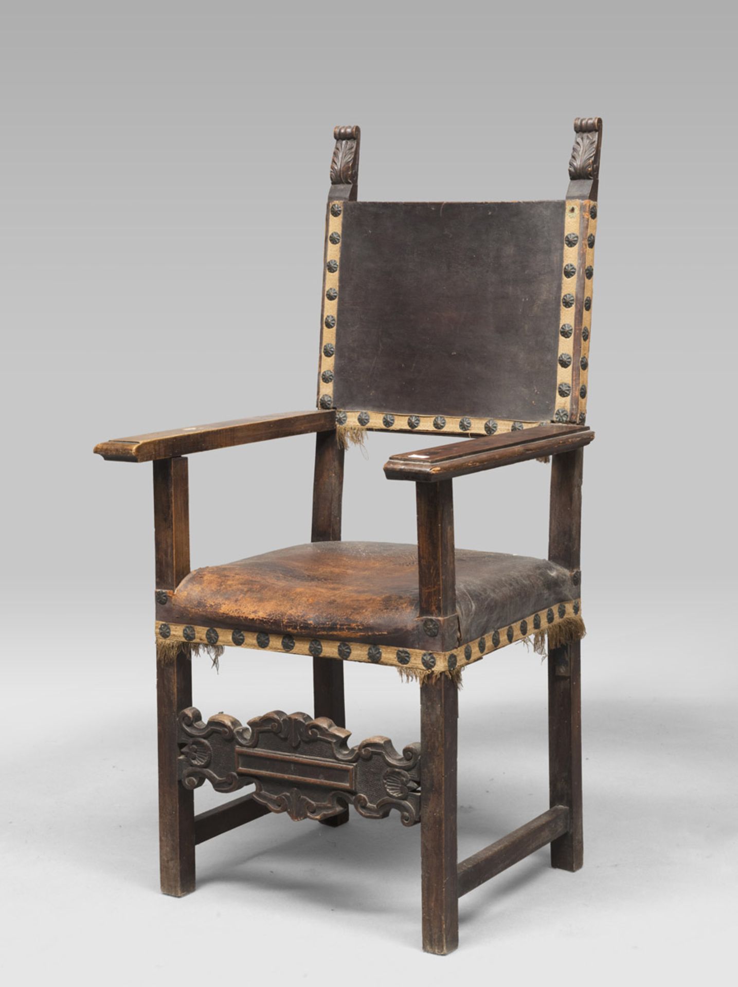 ARMCHAIR IN WALNUT, 19TH CENTURY of Renaissance taste, with rectangular back and flat arms.