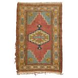 CARPET KARS, MID-20TH CENTURY with medallion scalettato, pink deep in the center field on.