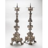 PAIR OF CANDLESTICKS IN SILVER-PLATED METAL, NAPLES O ROME 18TH CENTURY embossed to spiral, curls,