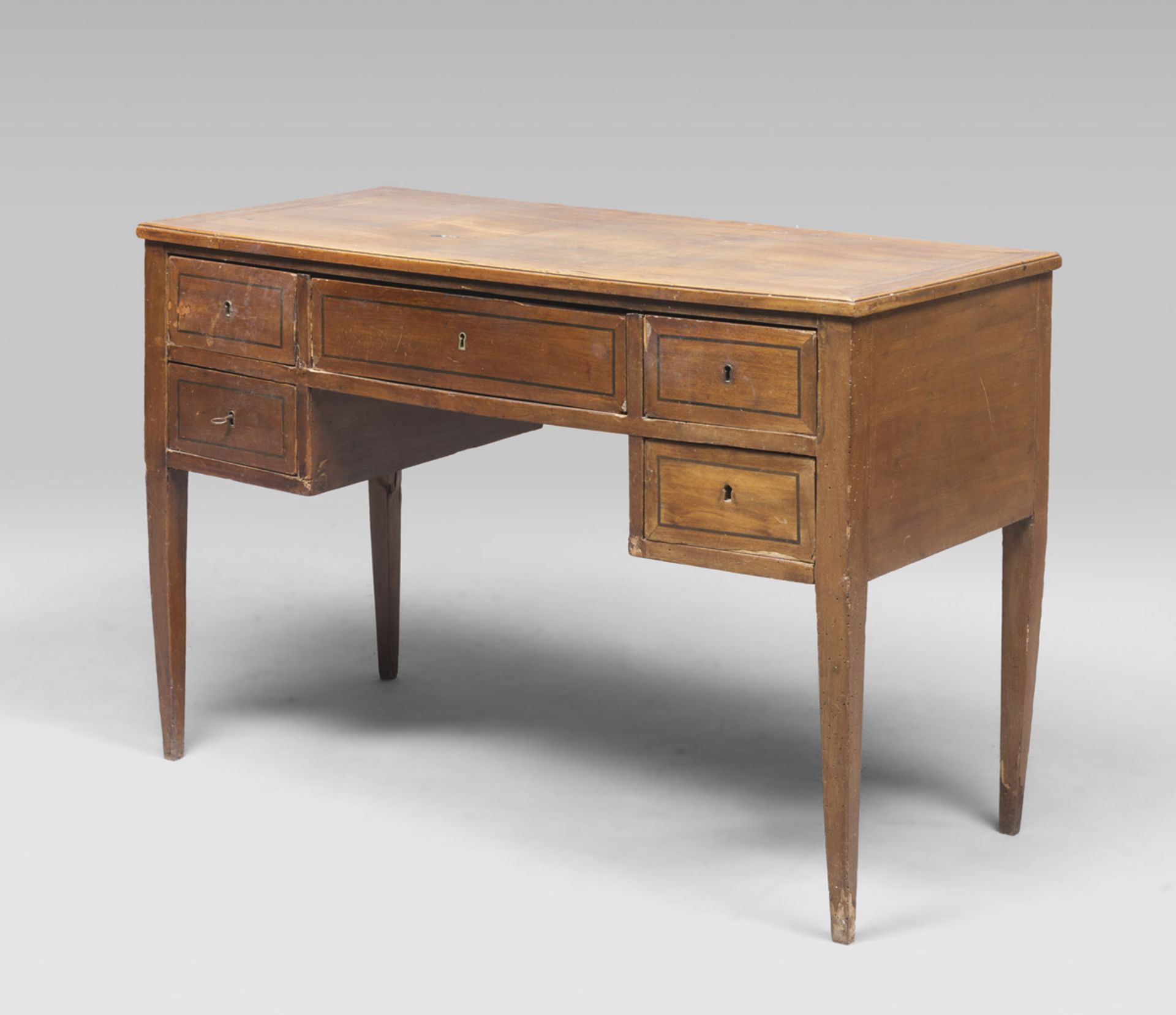 CHERRY-WOOD DESK, CENTRAL ITALY EARLY 19TH CENTURY with violet ebony edgings. Rectangular top,