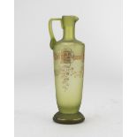 SMALL PITCHER IN GREEN GLASS, EARLY 20TH CENTURY sand-blasted ground with decorums in gold. Measures