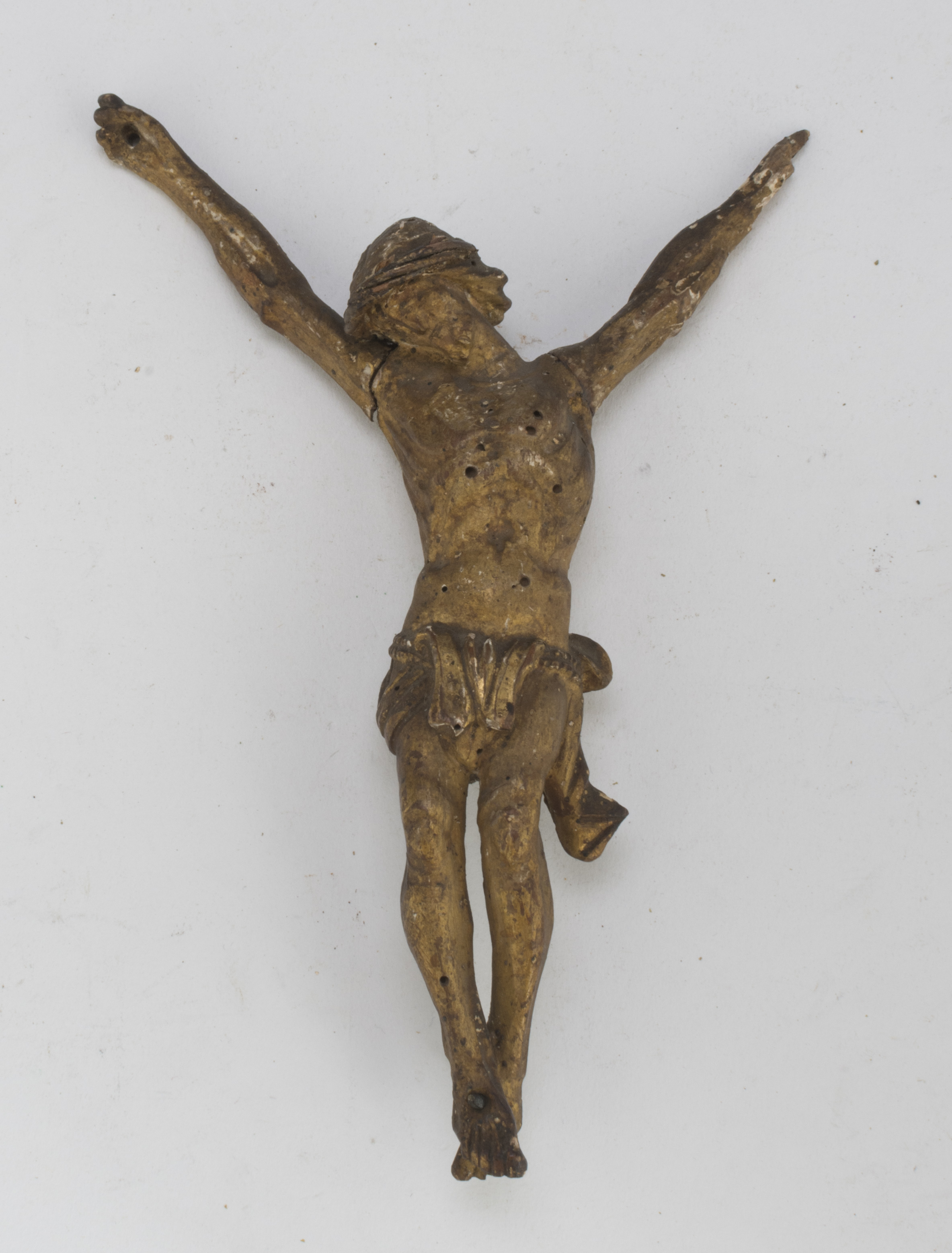 SMALL SCULPTURE OF CHRIST, 17TH CENTURY in giltwood, with mobile arms. Measures cm. 19 x 13 x 3. One