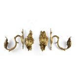 TWO PAIRS OF RODS, 19TH CENTURY in ormolu, with leaves endings. Measures cm. 20 x 7 x 17. DUE COPPIE