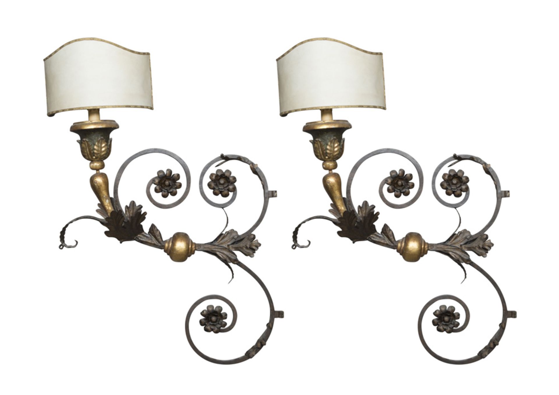PAIR OF LARGE WALL ARMS IN WROUGHT IRON, LATE 19TH CENTURY of seventeenth-century taste, with