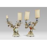 A PAIR OF SMALL PORCELAIN CANDELABRA, GINORI SECOLO arms in gilded wrought iron and mouthpieces in