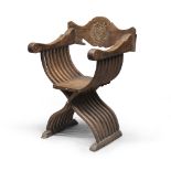 RARE SAVONAROLA CHAIR IN WALNUT, TUSCANY 17TH CENTURY mobile back splat centered by carving of