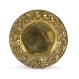 TRAY IN ORMOLU, 20TH CENTURY decorated with bas-reliefs of fruit. Diameter cm. 28. PIATTO IN