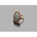 RING in yellow gold 18 kts., with central agate and rubies of contour. Total weight gr. 14,30.