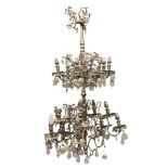 BRASS CHANDELIER, EARLY 20TH CENTURY double order of eight and twelve arms. Rich drop pendants in