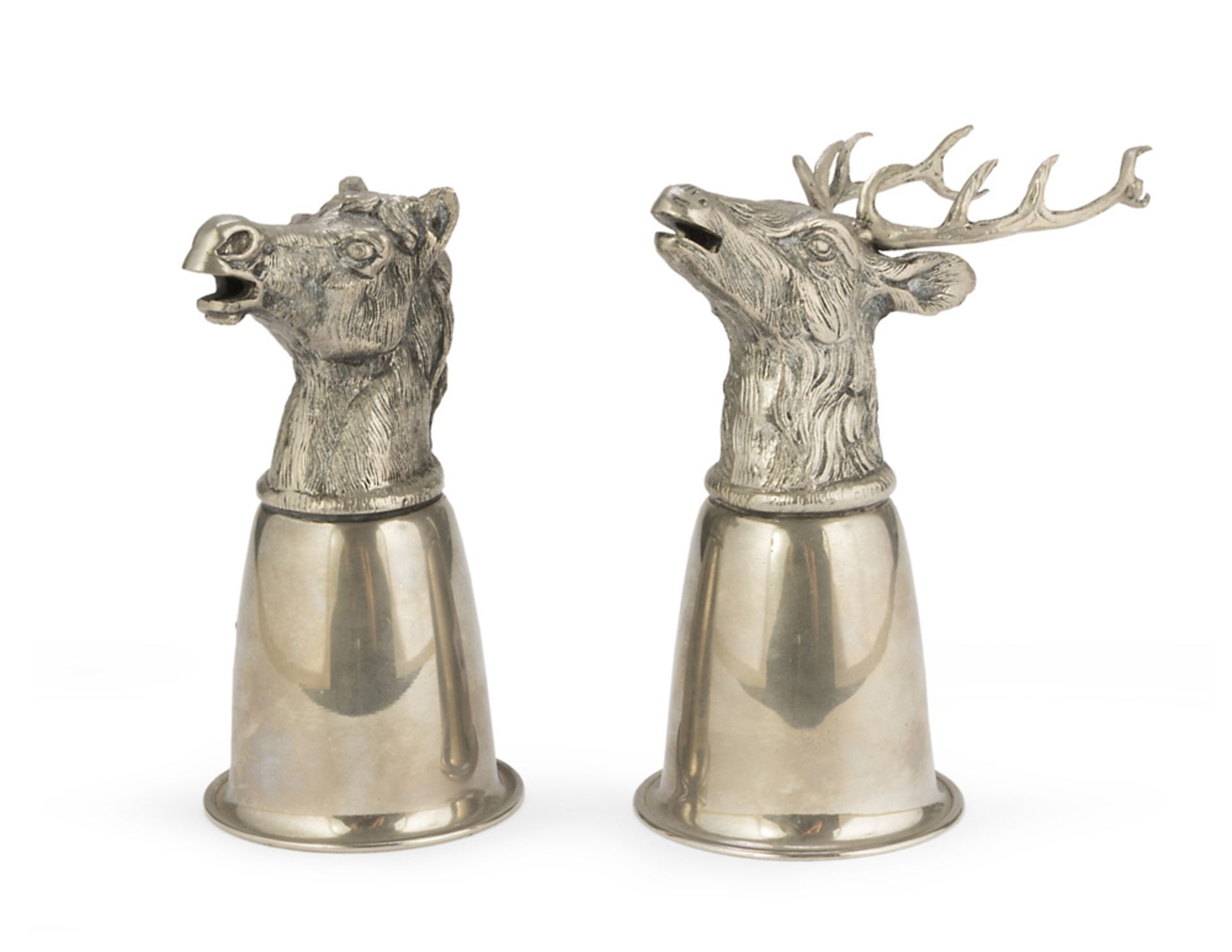 A PAIR OF SILVER-PLATED BEAKERS, EARLY 20TH CENTURY with grips to neck of buck and horse. Measures
