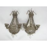 A PAIR OF APPLIQUES IN METAL AND GLASS, 19TH CENTURY with rows of small balls in cut and faceted