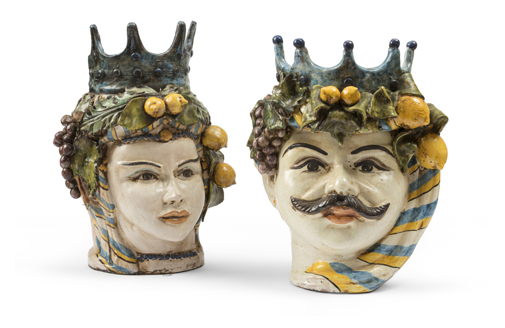 PAIR OF FIGURATIVE VASES IN MAIOLICA, CALTAGIRONE FIRST HALF OF 20TH CENTURY in polychromy,