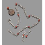 PARURE OF EARRINGS, CHOKER, RING AND PENDANT in silver and red coral. Pendant with Roman coin and