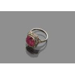 RING in white gold 18 kts., to dome with faceted cut semi-precious stone. Total weight gr. 3,40.