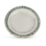 MAIOLICA DISH, SOUTH ITALY 19TH CENTURY to white enamel with edge in green and blue. Diameter cm.