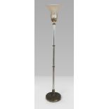 Floor lamp, America 1920s with shaft in transparent glass and round metal base. Light cup in