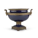 LARGE CENTERPIECE IN PORCELAIN, FRANCE PERIOD NAPOLEONE III to cobalt ground with oval basin.