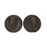 A PAIR OF COAT HOOKS IN CAST IRON, EARLY 20TH CENTURY shaped as heads of horses. Upright in ebonized