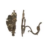 A PAIR OF CURTAIN RODS, 19TH CENTURY chiseled to floral motifs with arm to ramage. Measures cm. 24 x