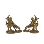 A BEAUTIFUL PAIR OF FIREDOGS IN ORMOLU, 18TH CENTURY uprights with twisted acanthus leaves, and