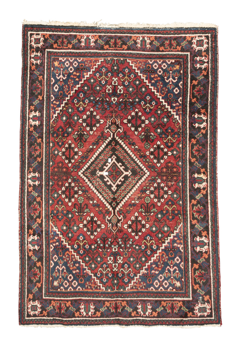 CENTRAL PERSIAN CARPET, MID-20TH CENTURY rhomboidal medallion with secondary motifs of small