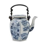 A CHINESE WHITE AND BLUE PORCELAIN TEAPOT, 20TH CENTURY. hexagonal shape decorated with motifs of