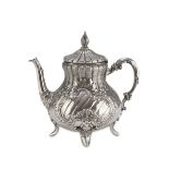 SILVER TEAPOT, PUCH VIENNA POST 1867 Handles with seperators in bone, four feet Silversmith 'N.A.'