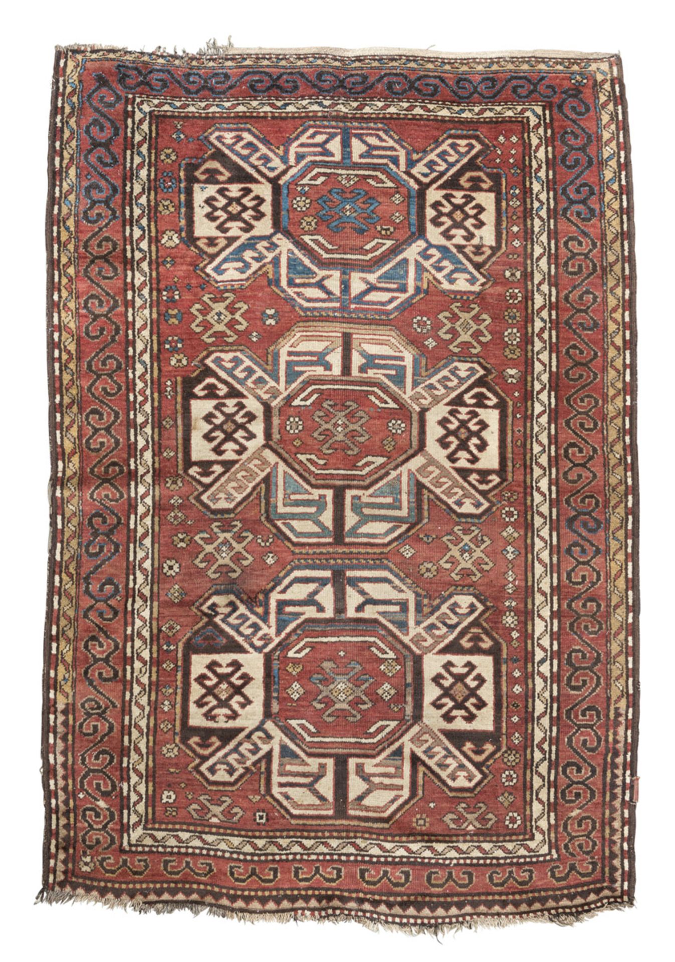 KARABAGH CARPET, LATE 19TH CENTURY gul design with animals and secondary motifs of rhombuses with