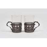 TWO GLASSHOLDERS IN SILVER AND FILIGREE, RUSSIA LATE 19TH CENTURY pierced to motifs of leaves and