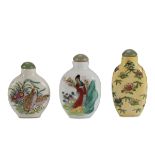 THREE CHINESE POLYCHROME PORCELAIN SNUFF BOTTLES, 20TH CENTURY decorated with quails, floral