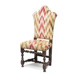 TALL WALNUT CHAIR, ELEMENTS OF THE 18TH CENTURY tall crenellated back, with spool legs and