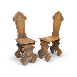 TWO CHAIRS IN FIR, EARLY 20TH CENTURY of Renaissance style, with carved backs and legs. Measures cm.