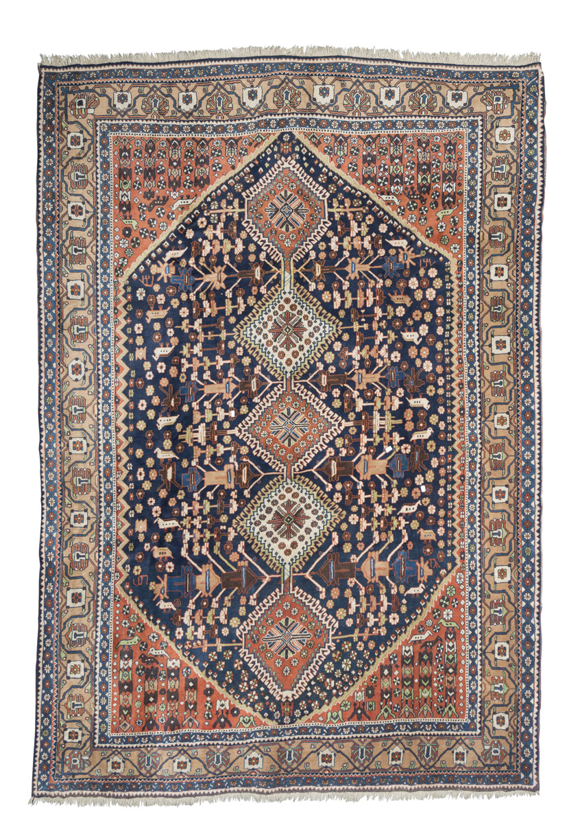 ANATOLIAN YURUK CARPET, MID-20TH CENTURY rhomboidal medallions with claws and secondary motifs of