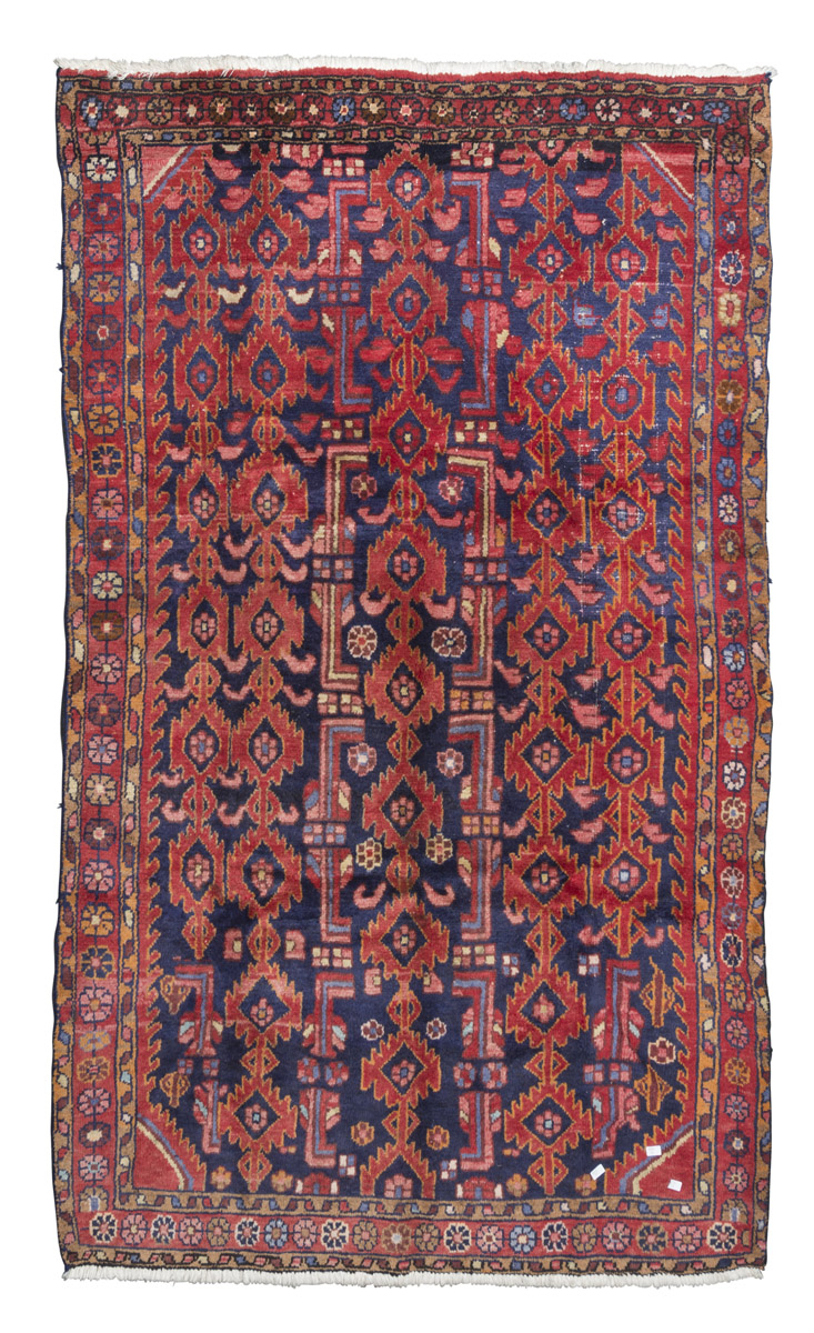 MALAYER CARPET, EARLY 20TH CENTURY with design of scaled rhombusses in the center field on blue